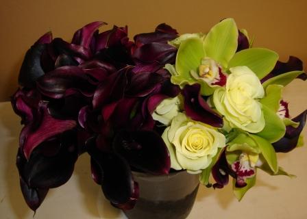 Bride bouquet of dk purple mini calla lilies MOH's of green cymbidium 