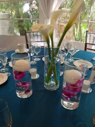 Orchid Lily centerpieces with beaded turq and silver wire