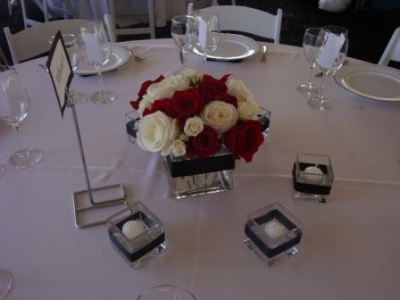 Centerpieces of red and white roses